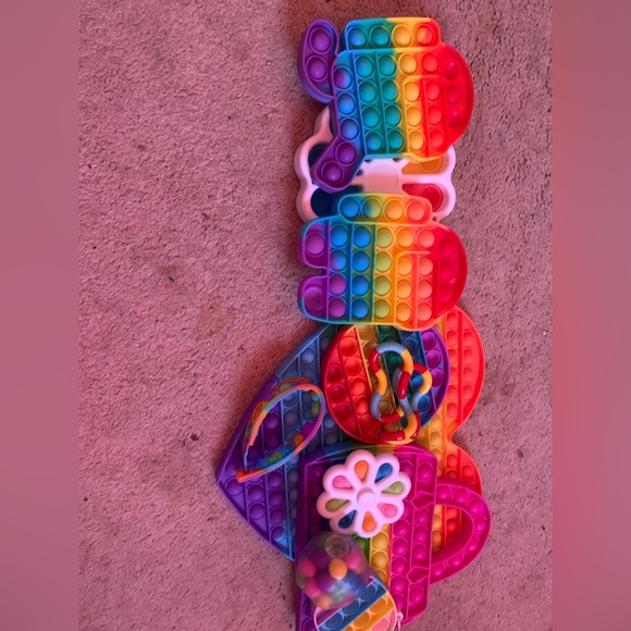 Rainbow pop it’s and fidget toys. - Picture 3 of 13